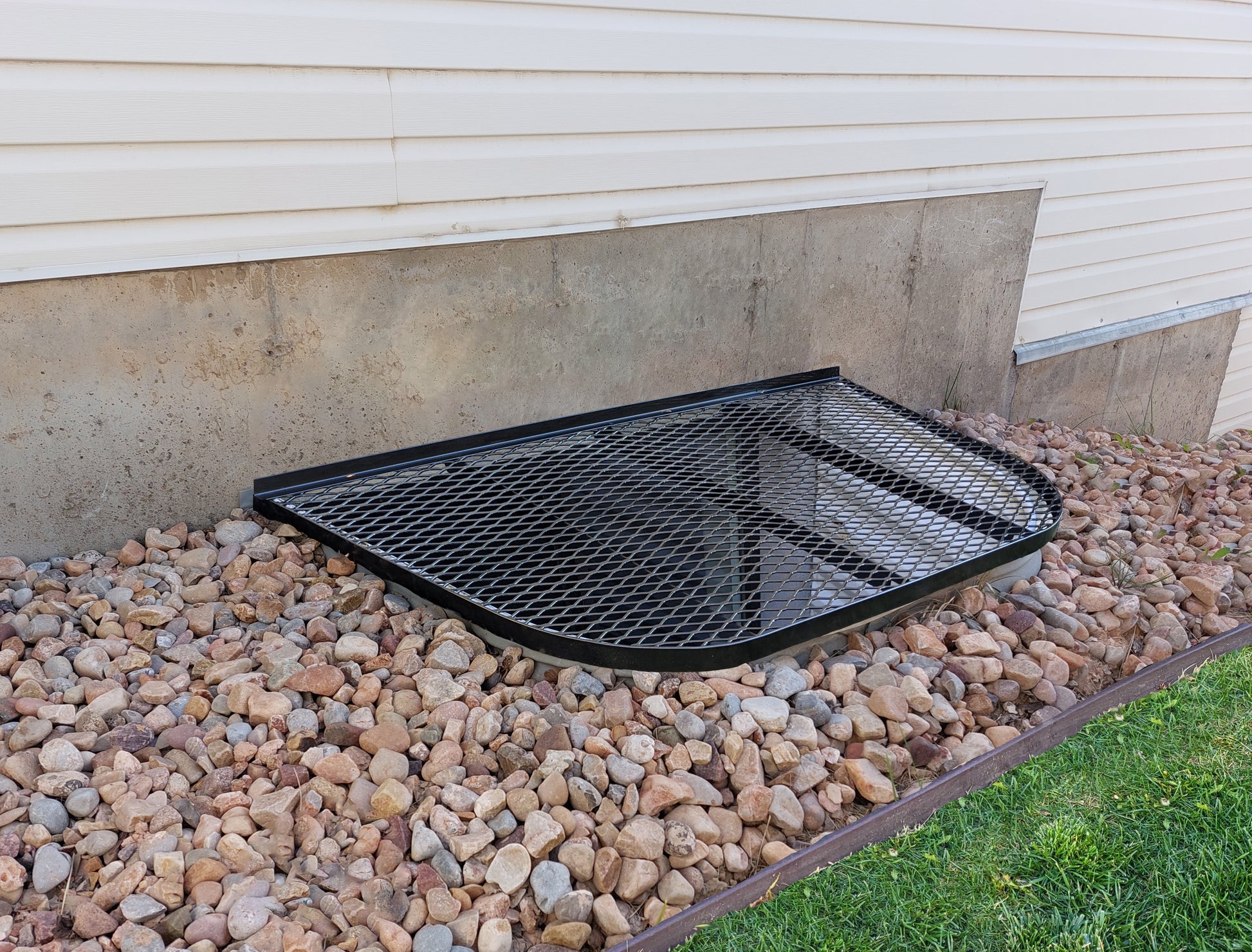 Affordable Steel Mesh Window Well Cover in Utah – SafeWell Window Well  Covers
